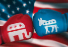 WATCH: Ad IGNITES Campaign Trail Red and blue boxing gloves with political party symbols.