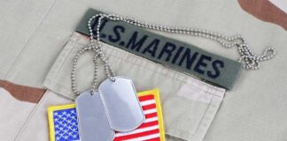 Marine Arrest Freezes Operations US Marines uniform with boots and dog tags