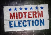 Voters Revolt: Trump Bleeds Support Midterm election poster on a brick wall