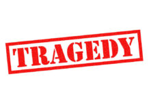 Red tragedy stamp on white background